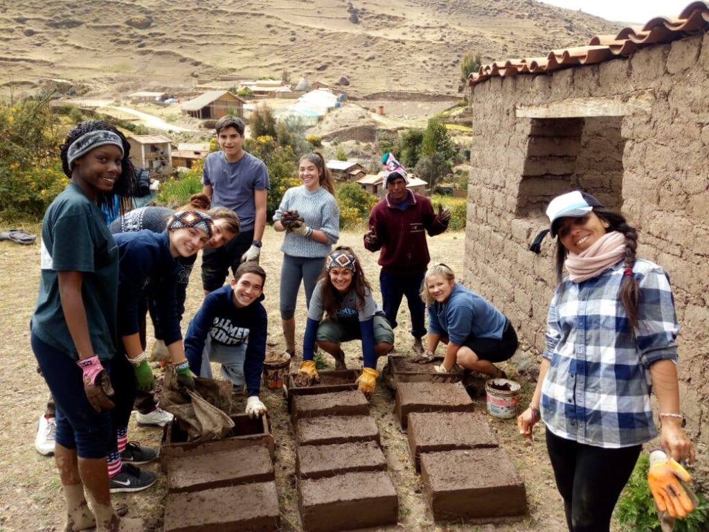 Volunteers building houses in Peru