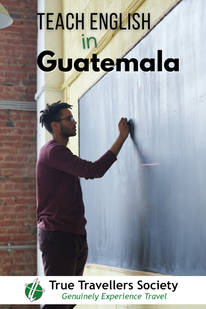 Teach English in Guatemala - Teacher writing on back board